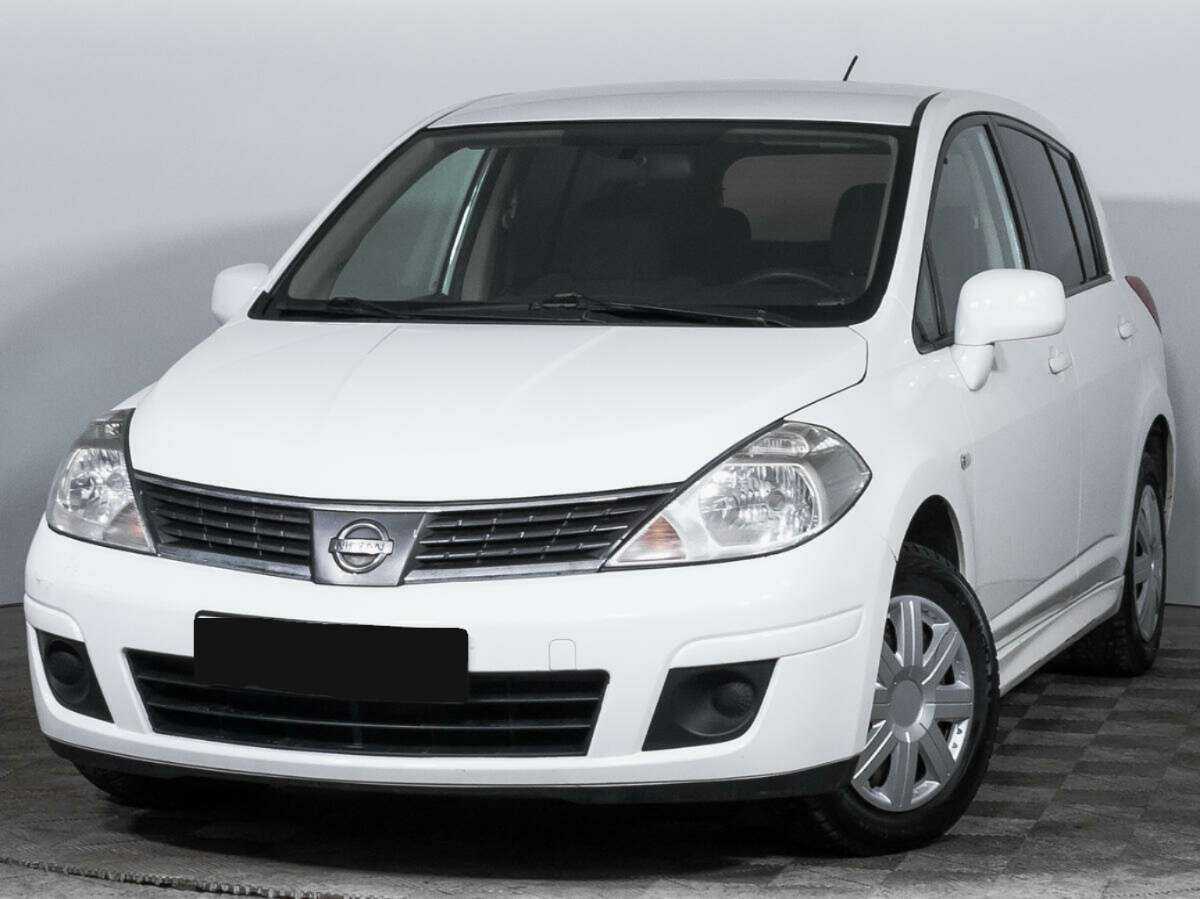 Nissan Tiida 2013 года с пробегом. Посмотреть фото