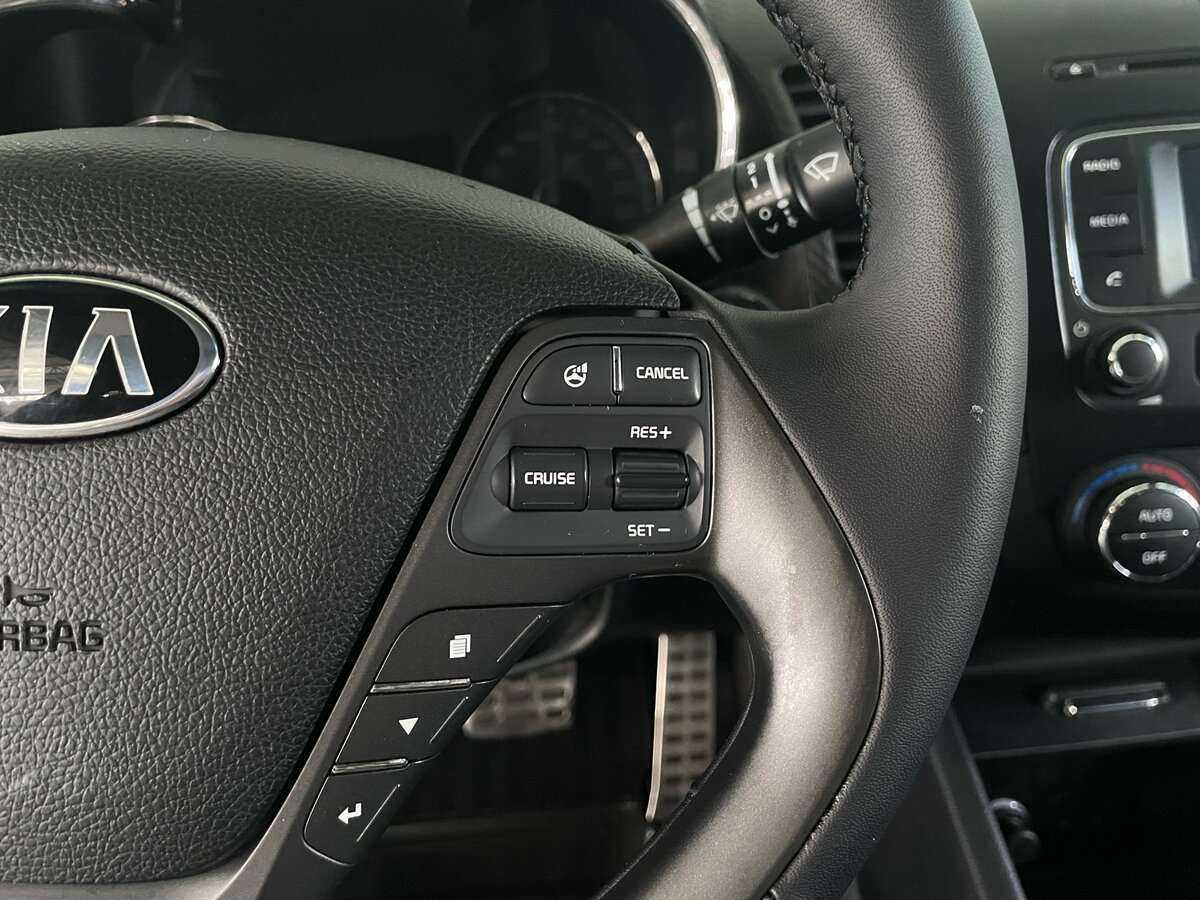 Kia Cerato 2014 года с пробегом. Фото: #12