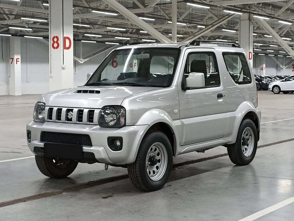 Suzuki Jimny 2013 года с пробегом. Посмотреть фото