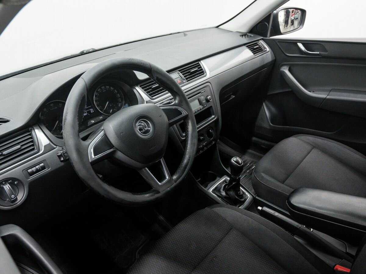 Skoda Rapid 2014 года с пробегом. Фото: #12