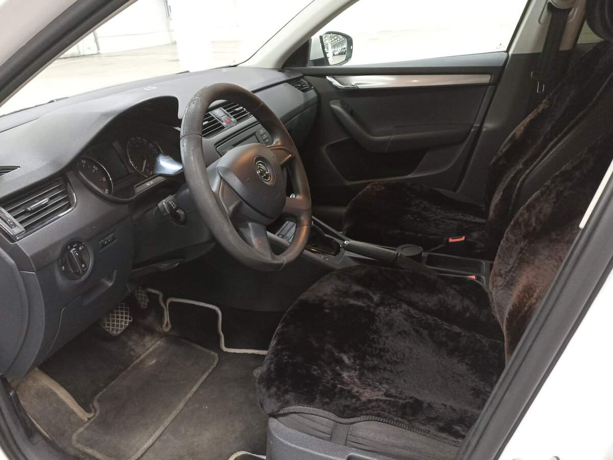 Skoda Octavia 2013 года с пробегом. Фото: #15