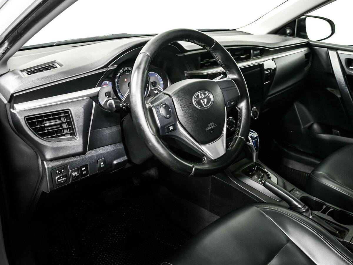 Toyota Corolla 2013 года с пробегом. Фото: #11