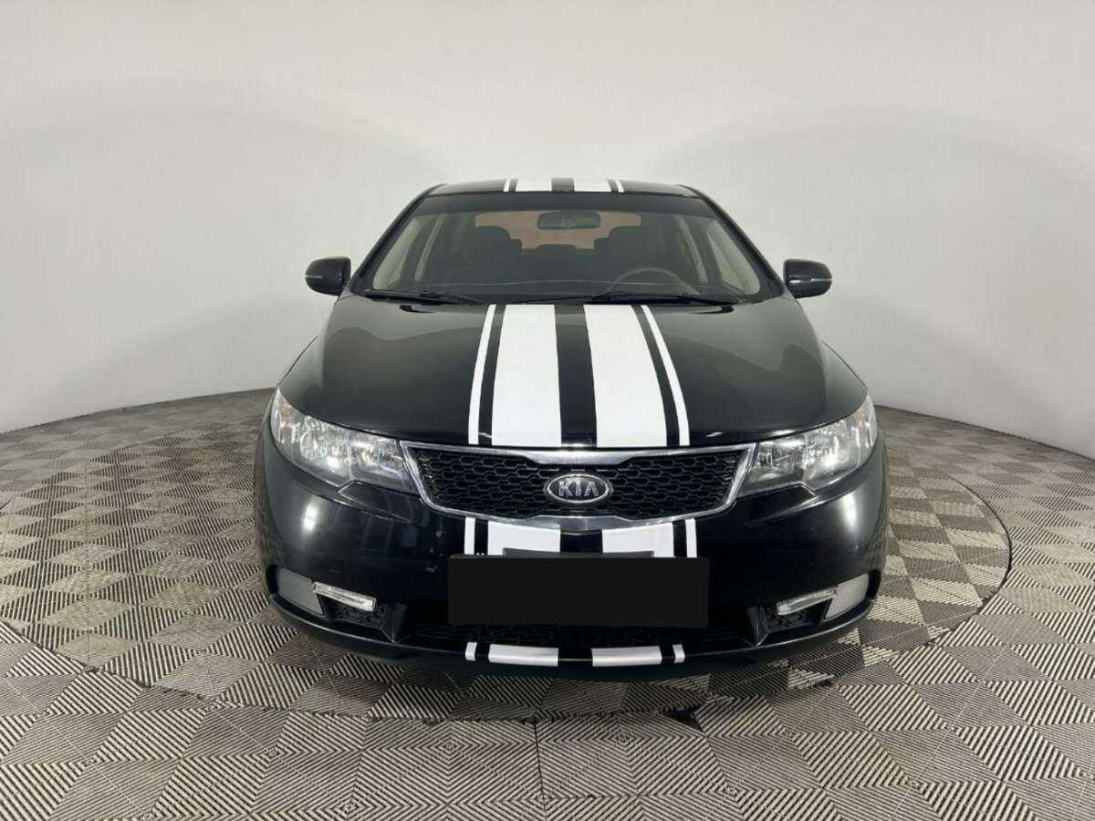 Kia Cerato 2013 года с пробегом. Фото: #1