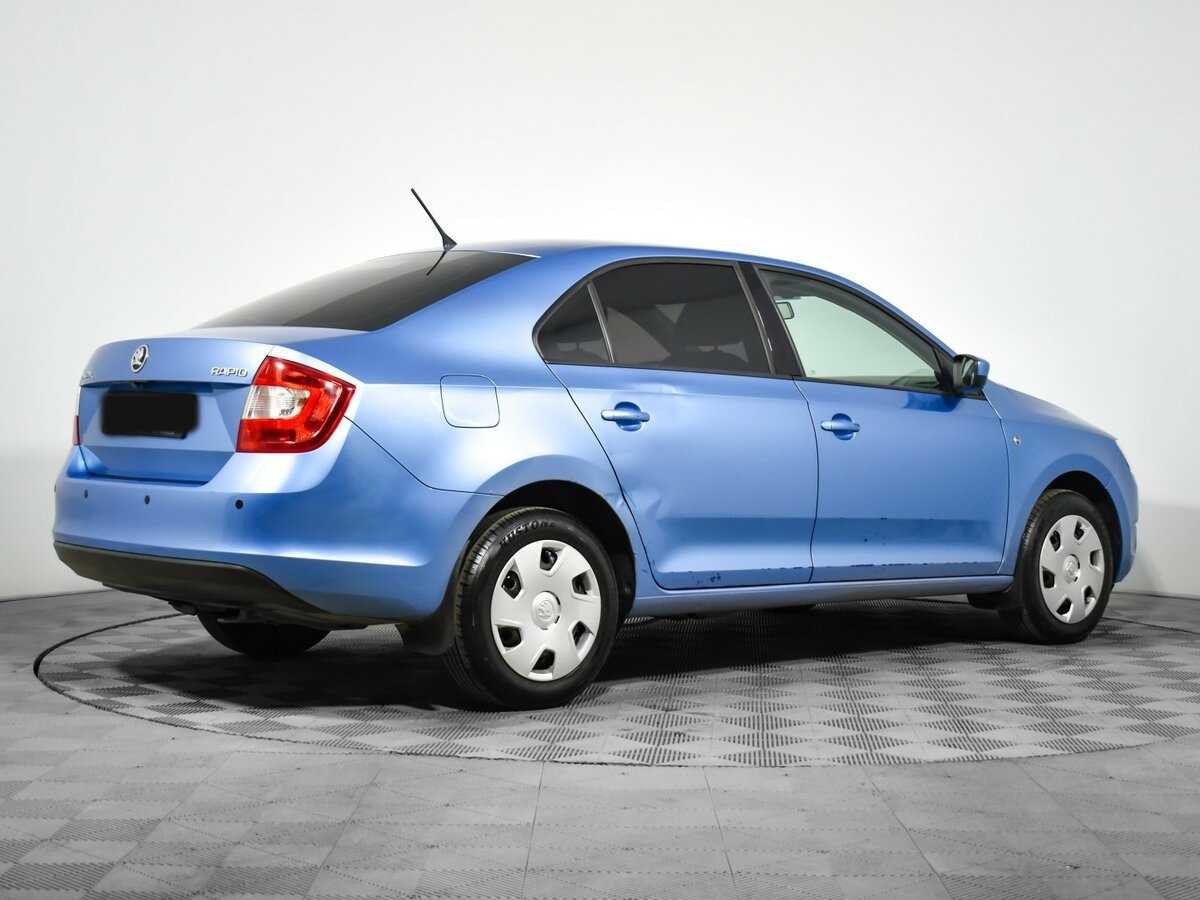 Skoda Rapid 2014 года с пробегом. Фото: #4