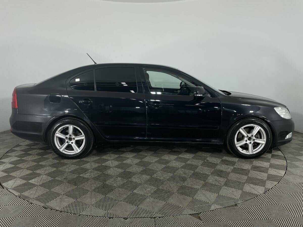 Skoda Octavia 2012 года с пробегом. Фото: #3