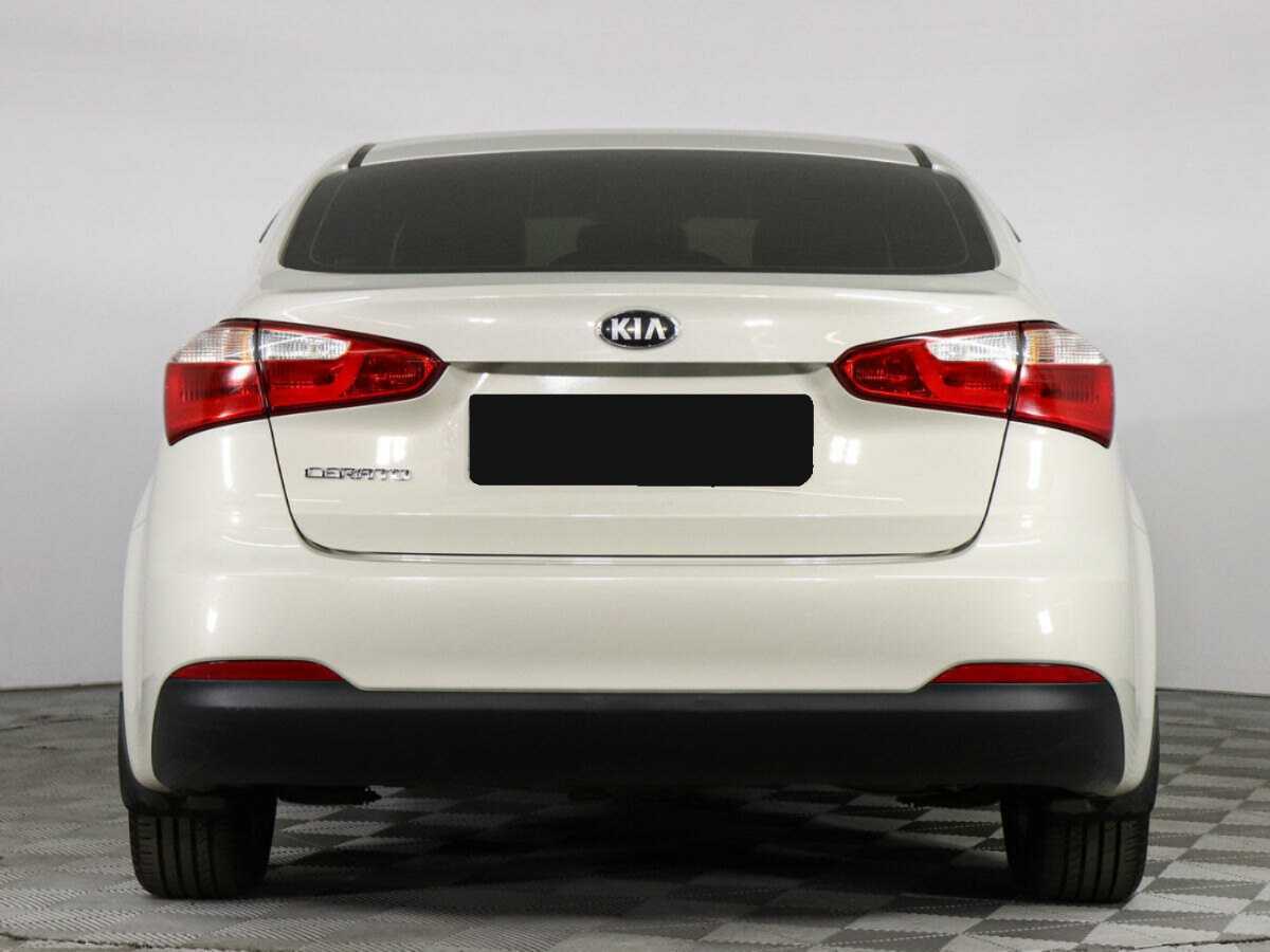 Kia Cerato 2013 года с пробегом. Фото: #5