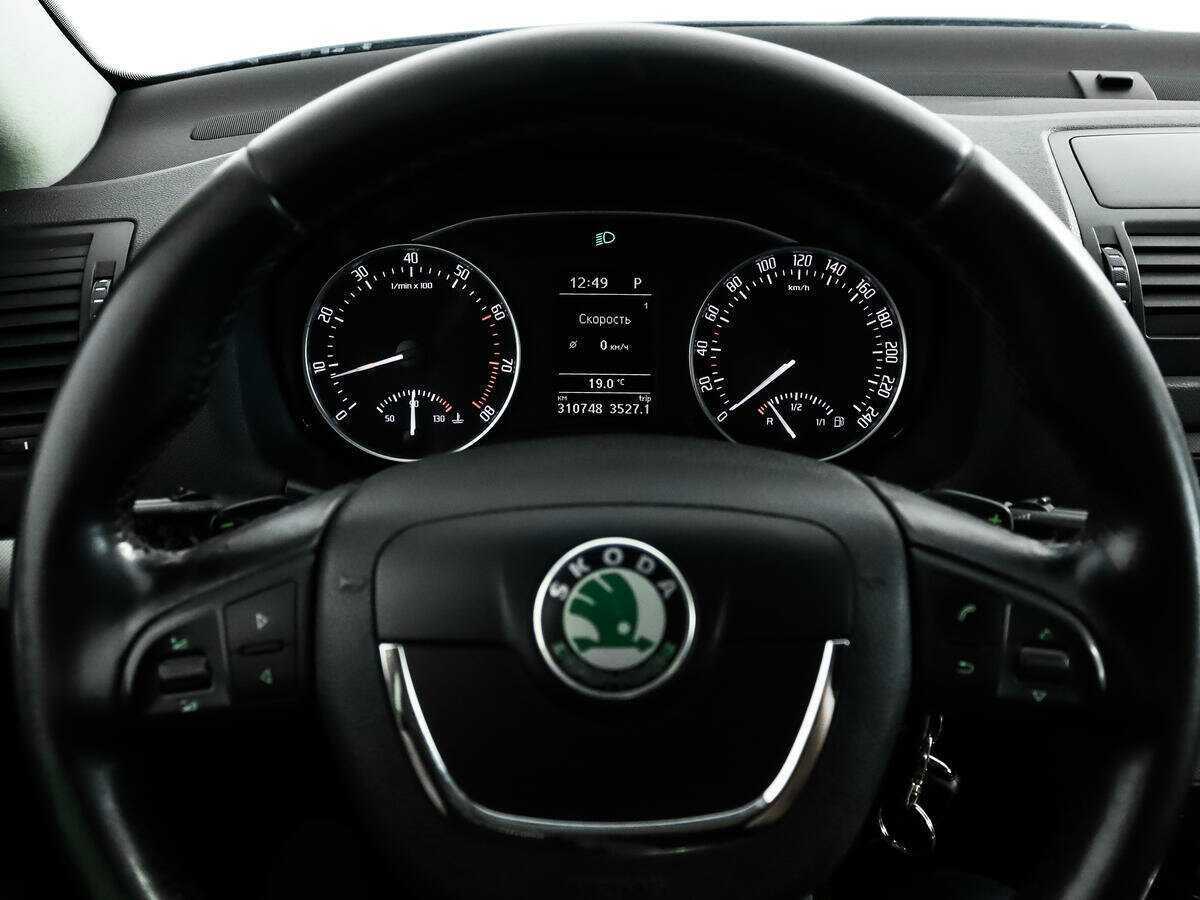 Skoda Octavia 2012 года с пробегом. Фото: #15