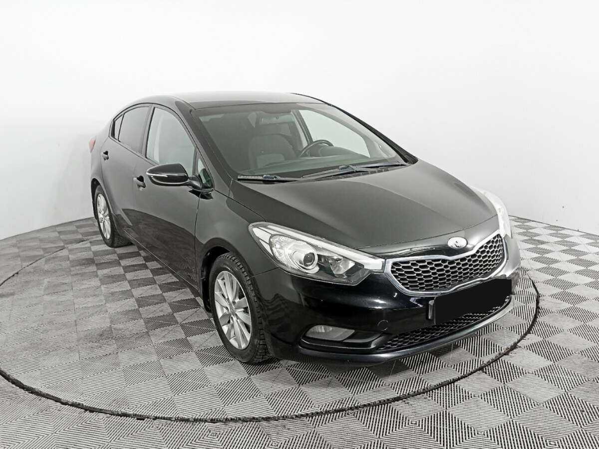 Kia Cerato 2013 года с пробегом. Фото: #2