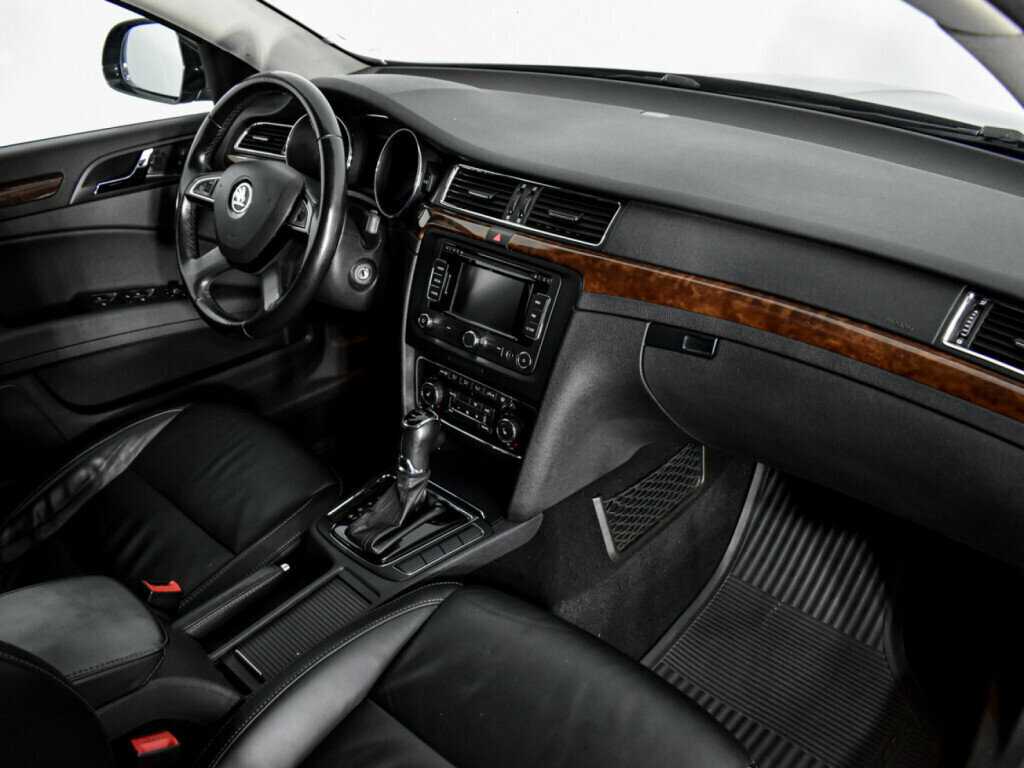 Skoda Superb 2013 года с пробегом. Фото: #9