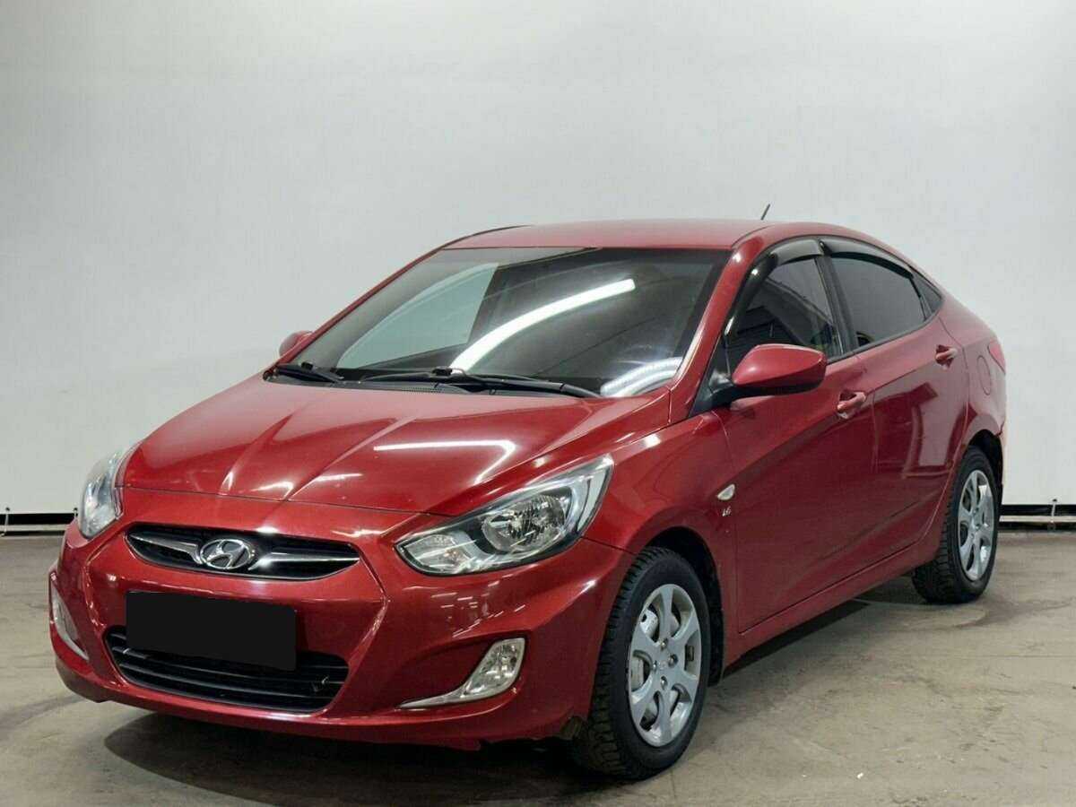 Hyundai Solaris 2013 года с пробегом. Посмотреть фото