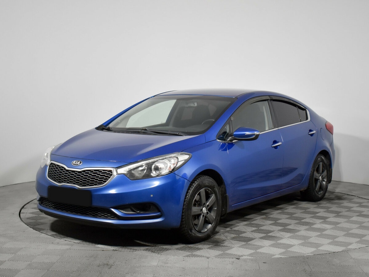 Kia Cerato 2014 года с пробегом. Посмотреть фото