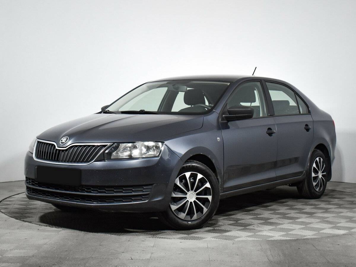 Skoda Rapid 2014 года с пробегом. Посмотреть фото