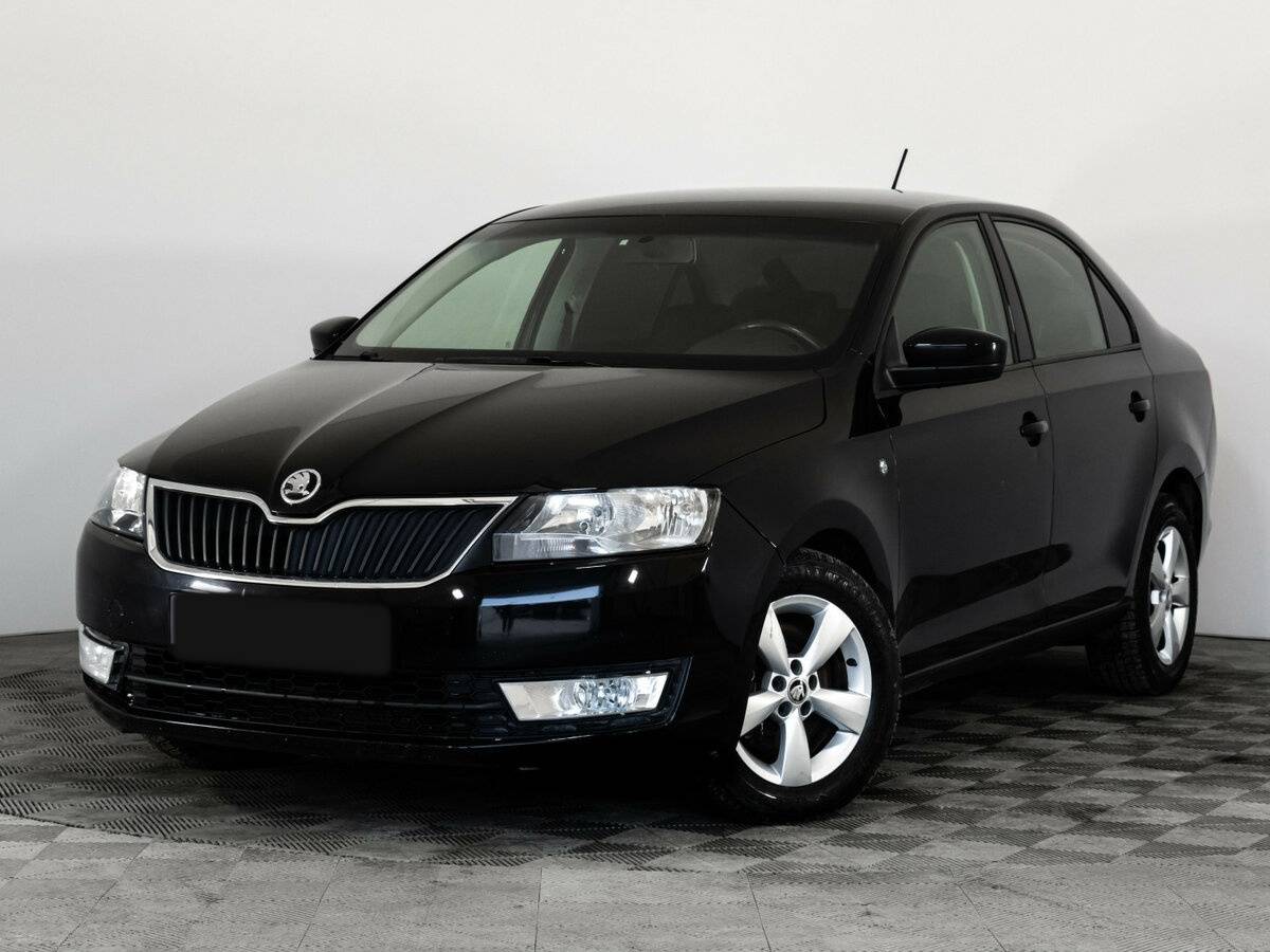Skoda Rapid 2015 года с пробегом. Посмотреть фото