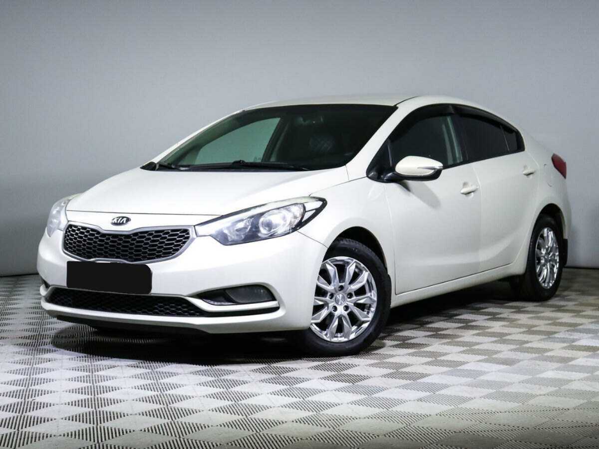 Kia Cerato 2014 года с пробегом. Посмотреть фото