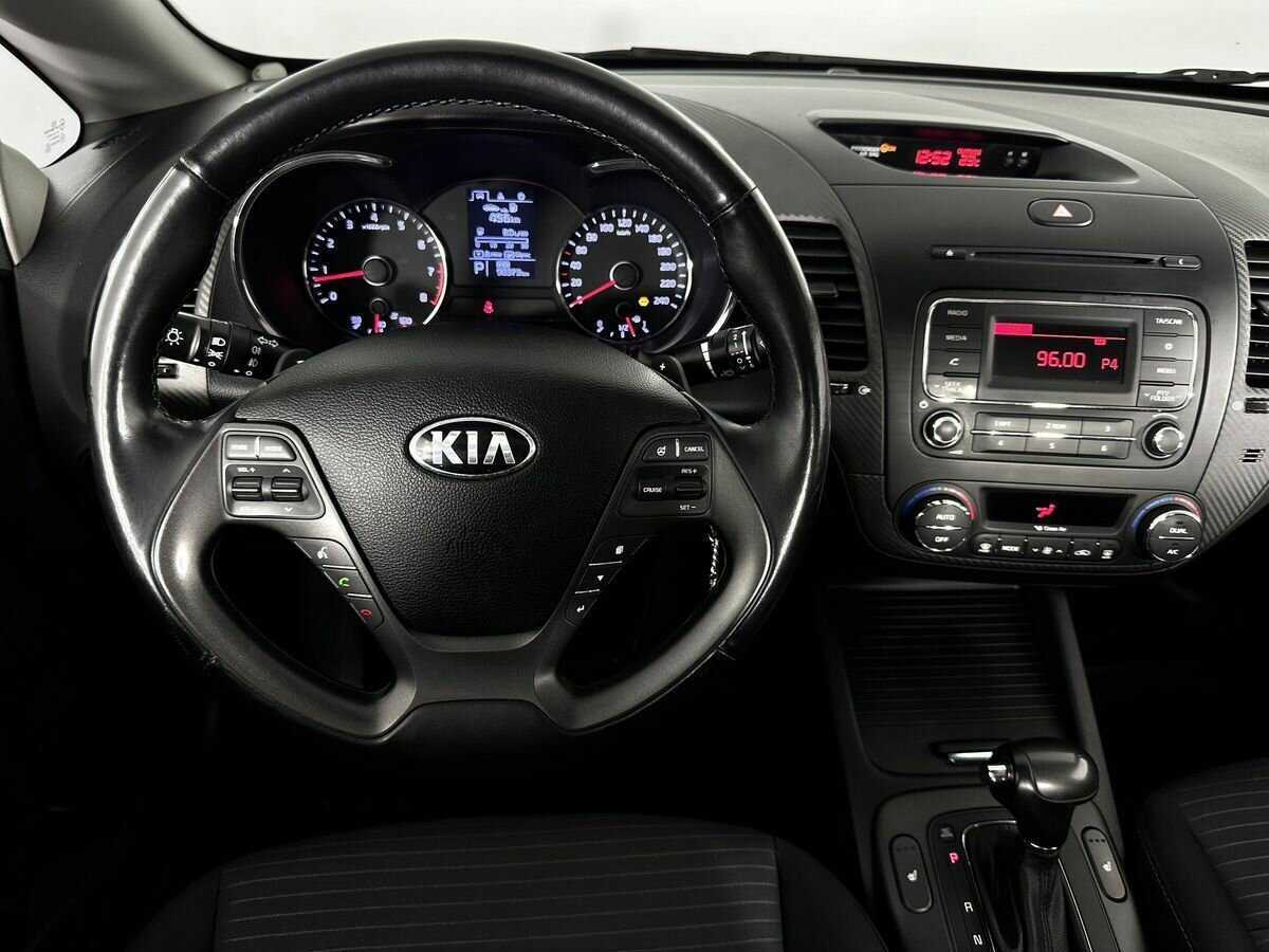 Kia Cerato 2014 года с пробегом. Фото: #6