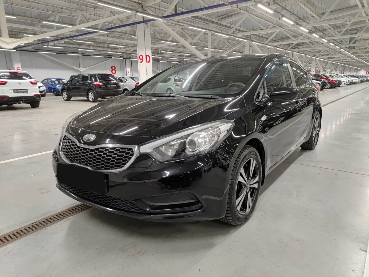 Kia Cerato 2013 года с пробегом. Посмотреть фото