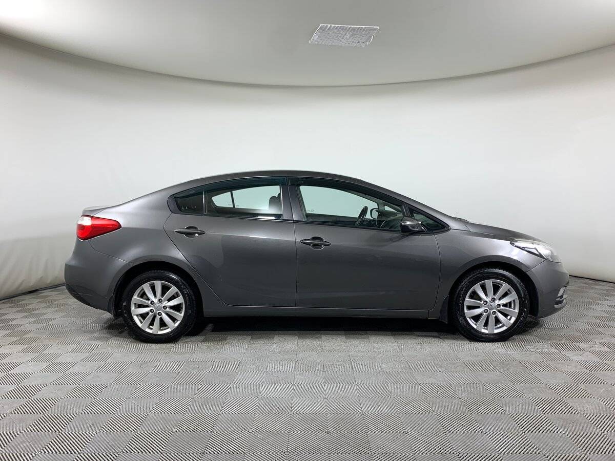 Kia Cerato 2013 года с пробегом. Фото: #3