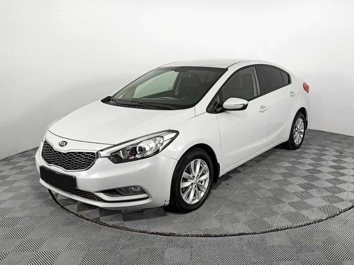Kia Cerato 2014 года с пробегом. Посмотреть фото