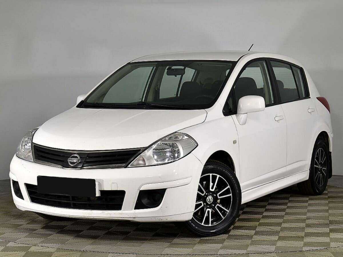 Nissan Tiida 2013 года с пробегом. Посмотреть фото