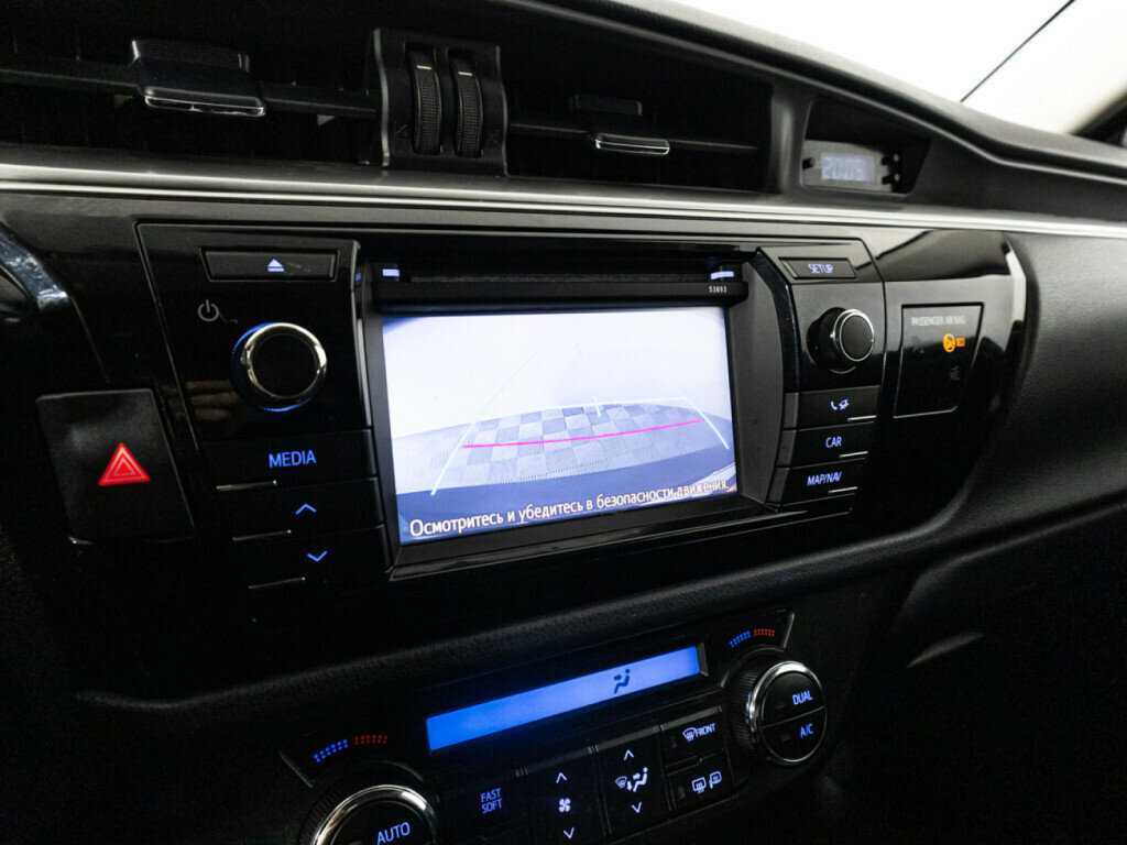 Toyota Corolla 2014 года с пробегом. Фото: #14