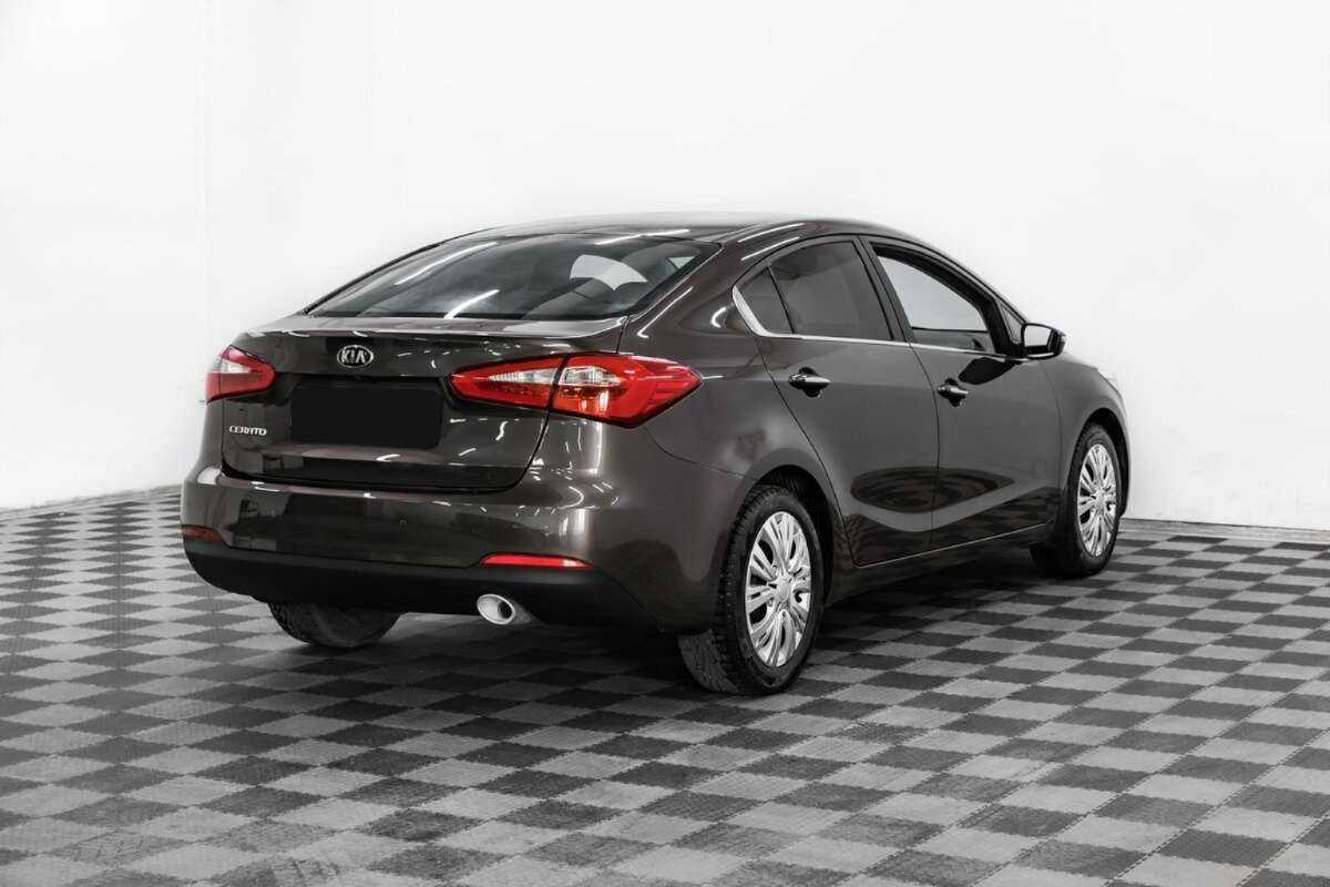 Kia Cerato 2013 года с пробегом. Фото: #3