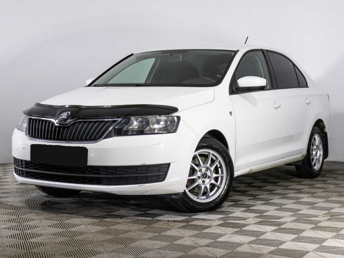 Skoda Rapid 2014 года с пробегом. Посмотреть фото