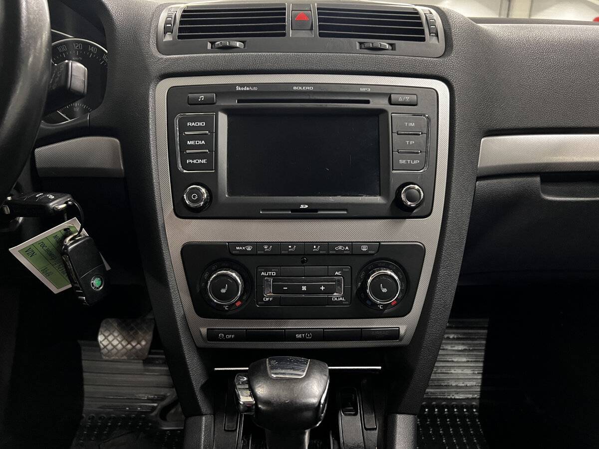 Skoda Octavia 2012 года с пробегом. Фото: #13