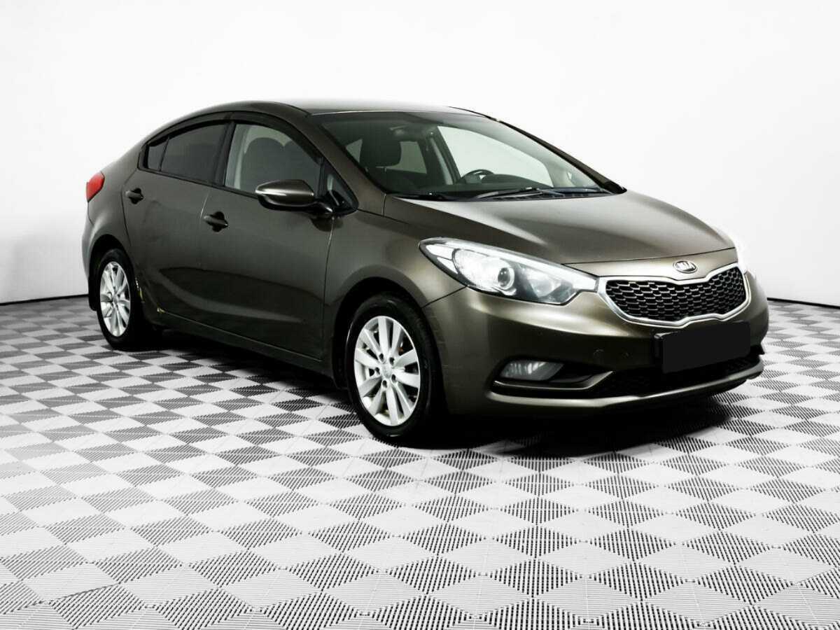 Kia Cerato 2014 года с пробегом. Фото: #2