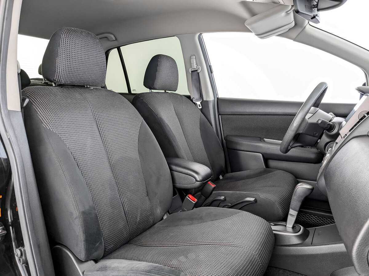 Nissan Tiida 2013 года с пробегом. Фото: #18