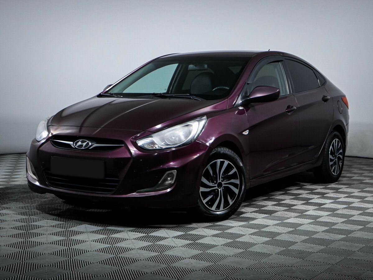 Hyundai Solaris 2013 года с пробегом. Посмотреть фото