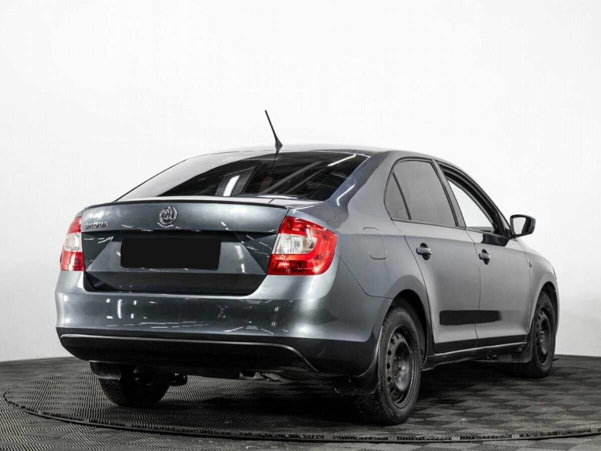 Skoda Rapid 2014 года с пробегом. Фото: #3