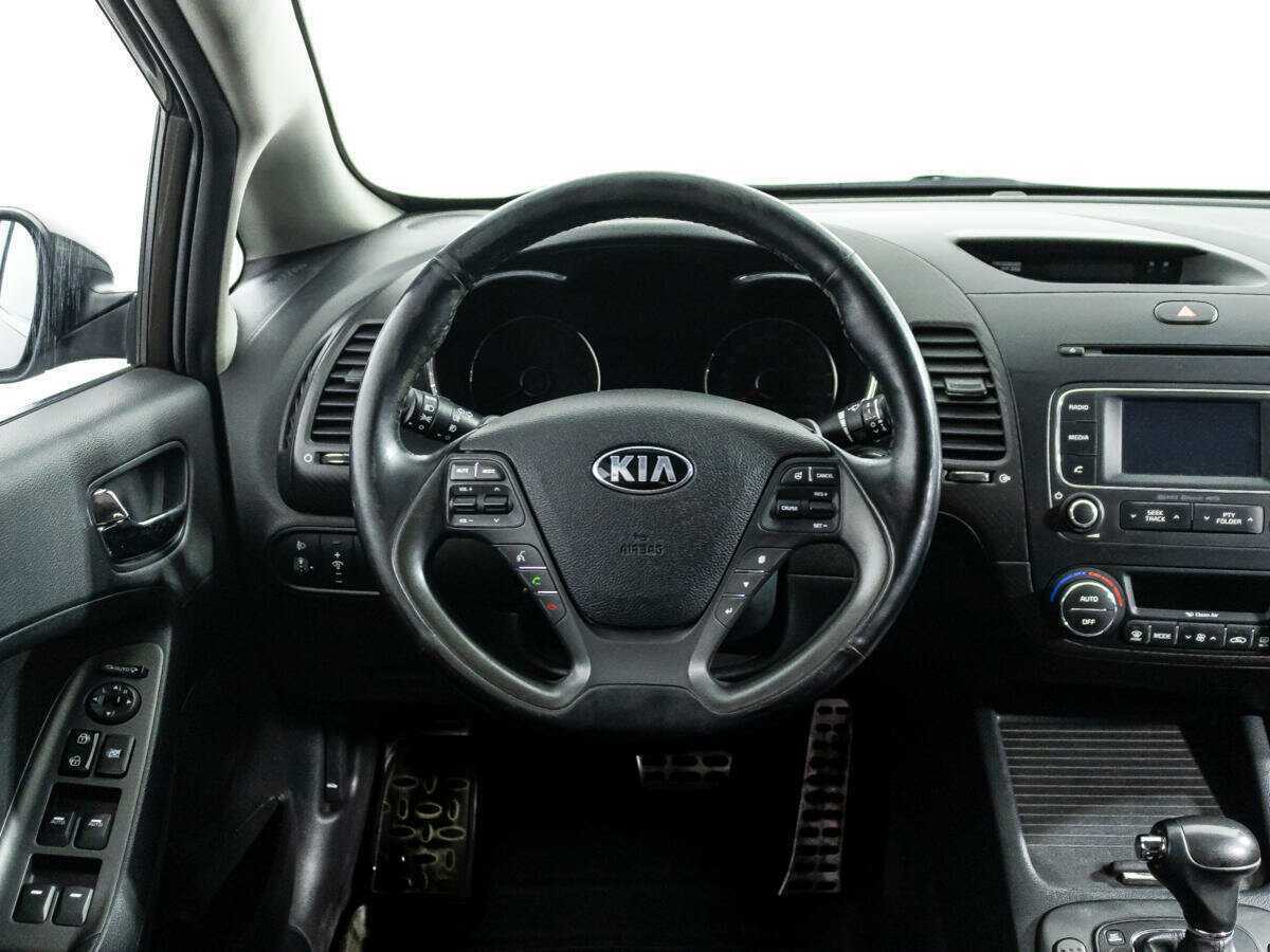Kia Cerato 2015 года с пробегом. Фото: #18