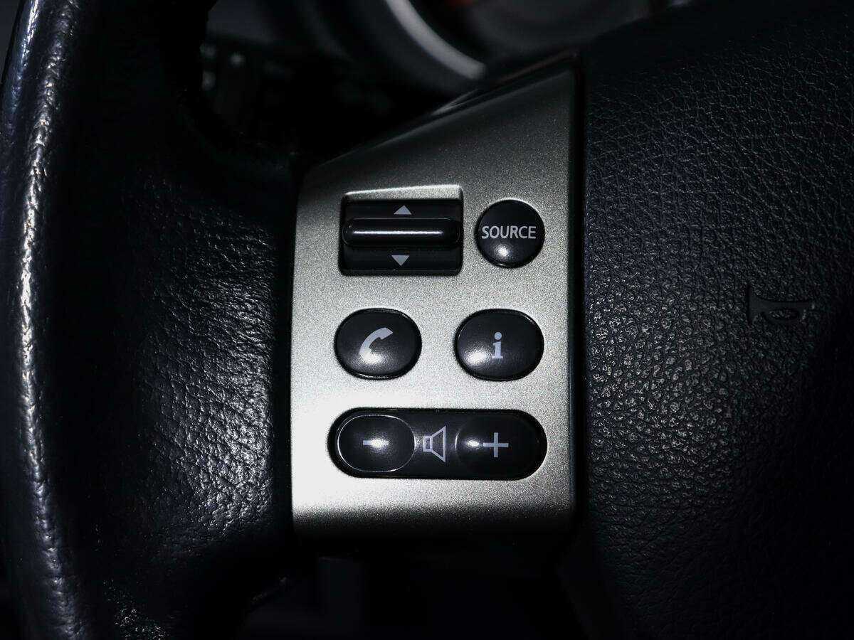 Nissan Tiida 2012 года с пробегом. Фото: #17