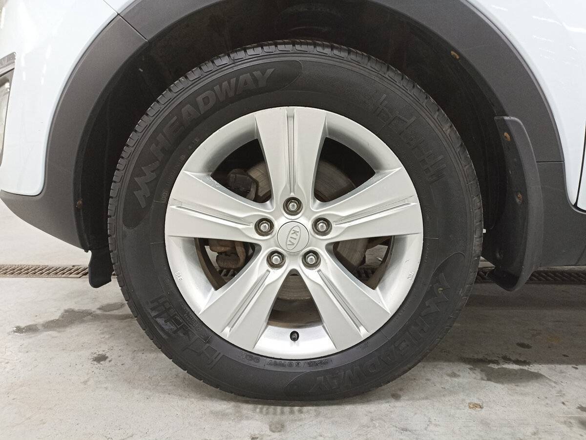 Б/У Киа Спортейдж 2013 года. Фото: #17